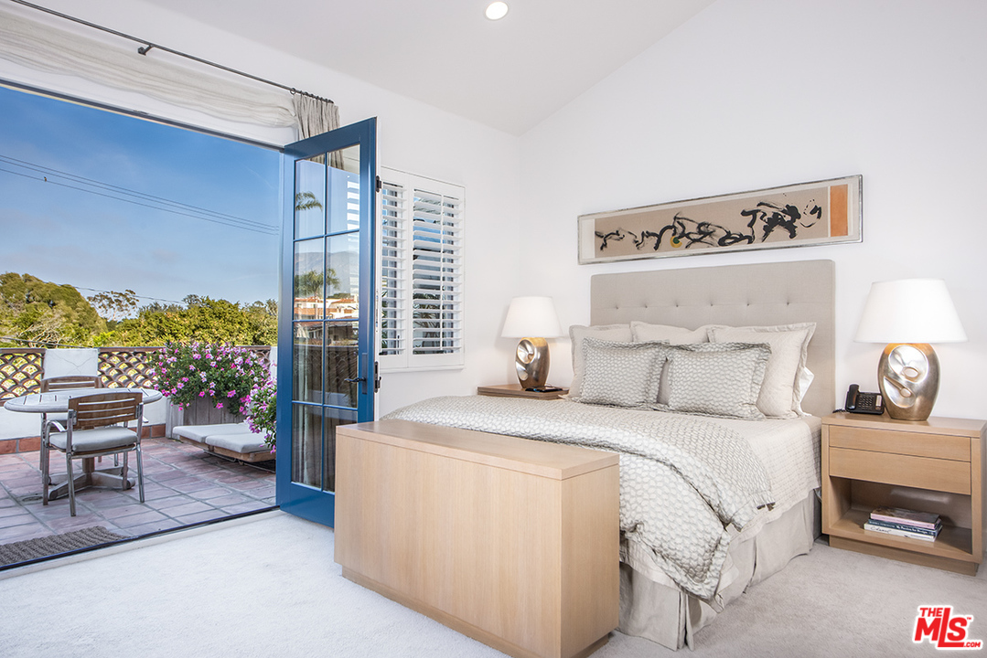 1286 Coast Village Road Montecito, CA 93108 - Photo 11 of 23 a bed room with a bed and a chair