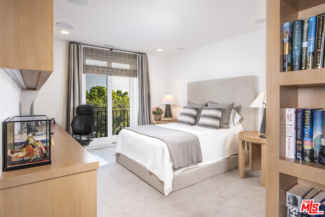 1286 Coast Village Road Montecito, CA 93108 - Photo 17 of 23 a bedroom with bed and a large window