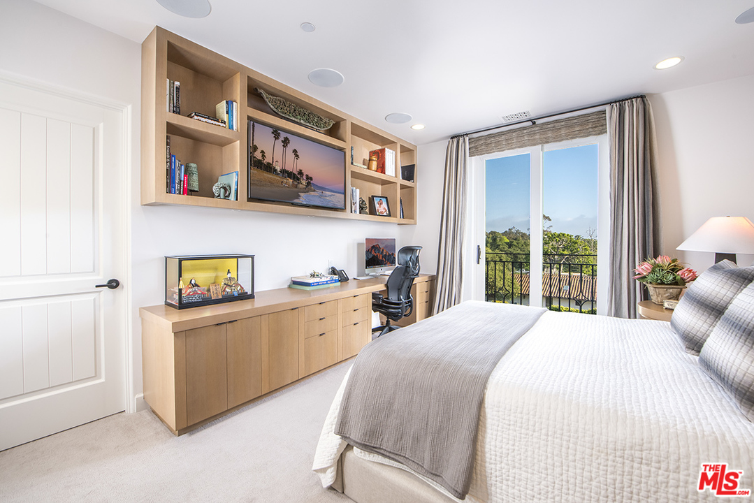 1286 Coast Village Road Montecito, CA 93108 - Photo 18 of 23 a bedroom with a bed wooden floor and window