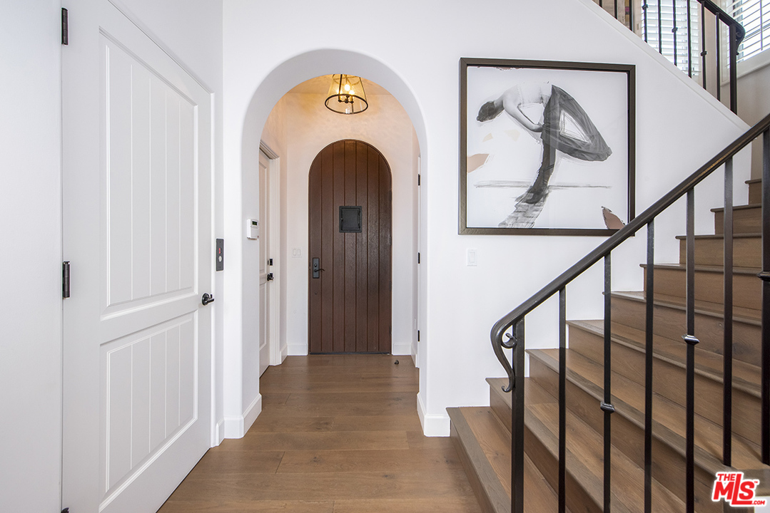 1286 Coast Village Road Montecito, CA 93108 - Photo 4 of 23 a view of front door with wooden floor