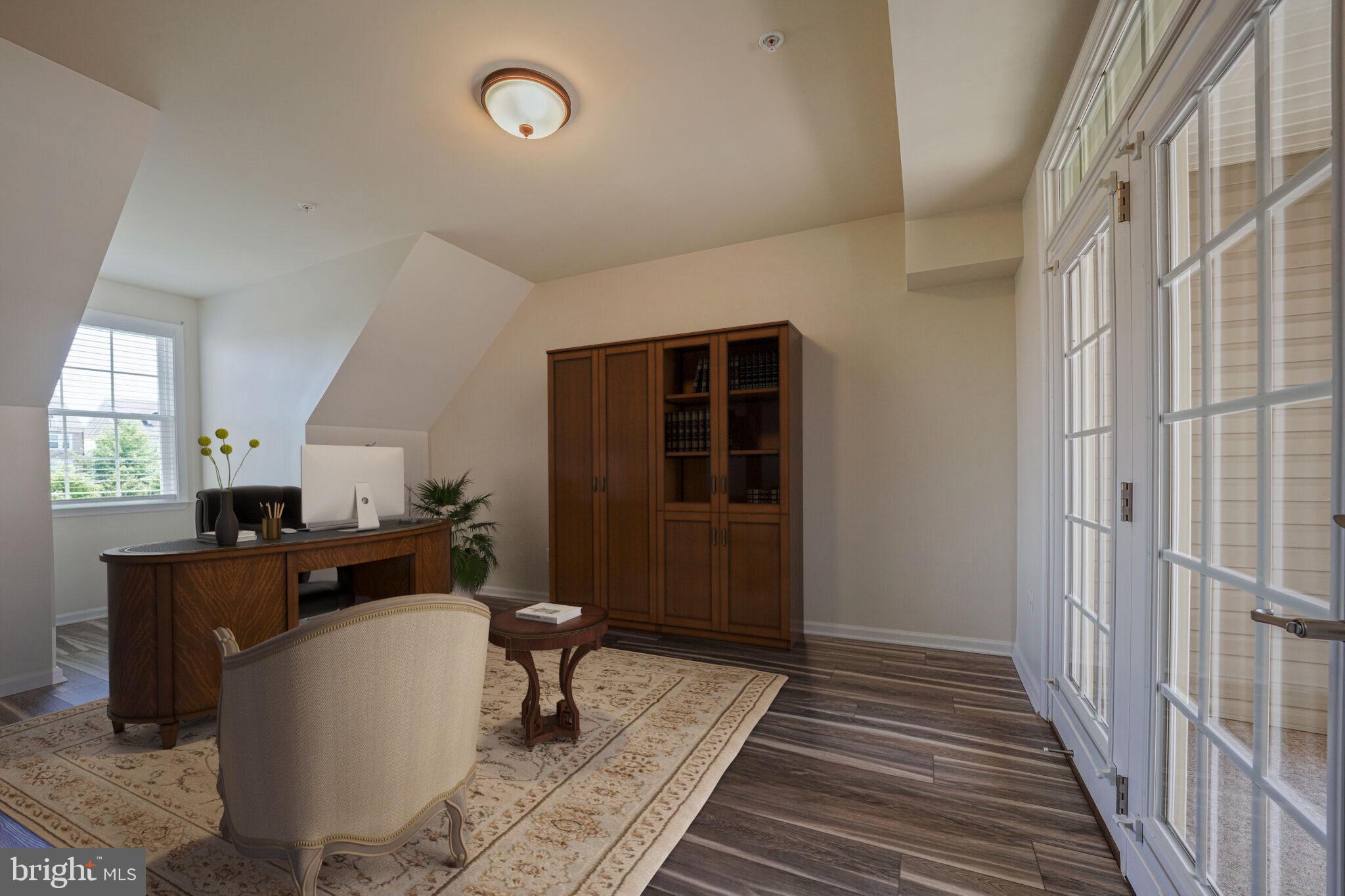 42550 Sunset Ridge Square Ashburn, VA 20148 - Photo 15 of 36 a workspace with wooden floor