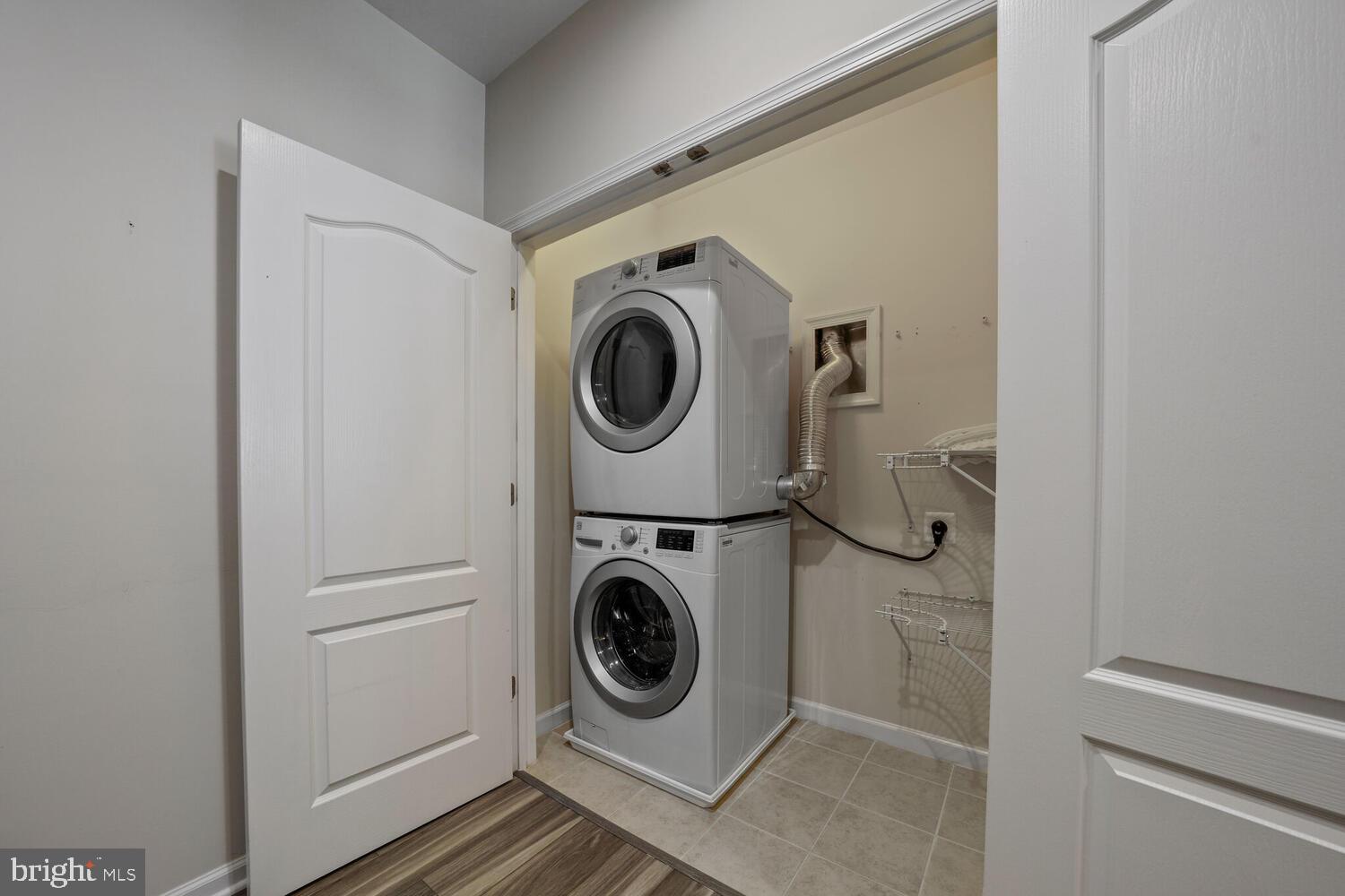 42550 Sunset Ridge Square Ashburn, VA 20148 - Photo 17 of 36 a utility room with dryer and washer