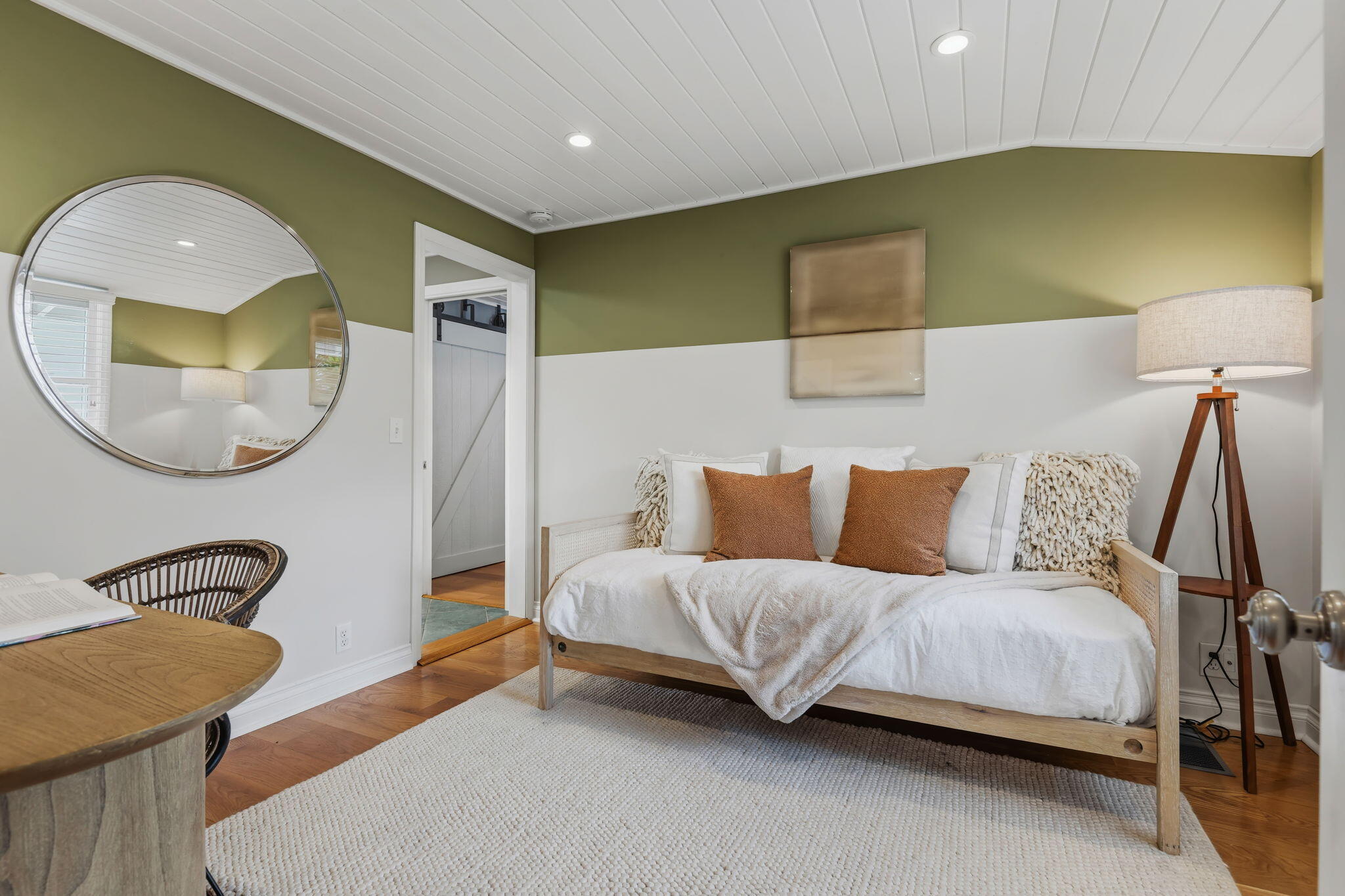 2129 Red Rose Way Santa Barbara, CA 93109 - Photo 24 of 44 a bedroom with a bed and a mirror