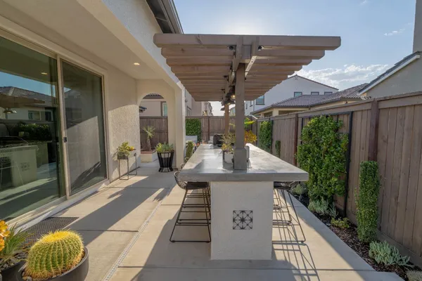 a view of a backyard with furniture
