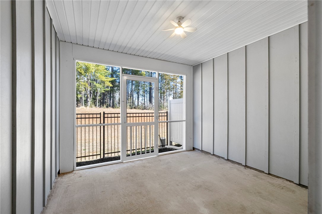 506 Roan Creek Trail Anderson, SC 29621 - Photo 26 of 33 This screened porch provides a peaceful outdoor retreat, perfect for enjoying nature's tranquility.