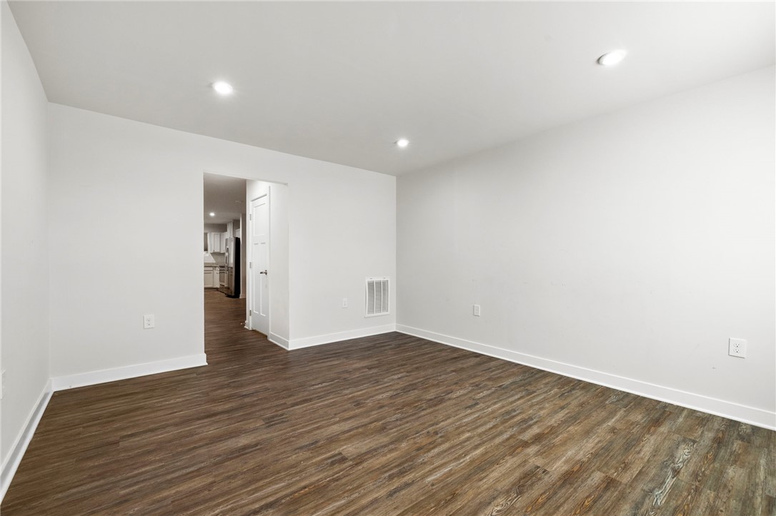 506 Roan Creek Trail Anderson, SC 29621 - Photo 4 of 33 This versatile space features durable flooring and bright lighting, perfect for everyday living.