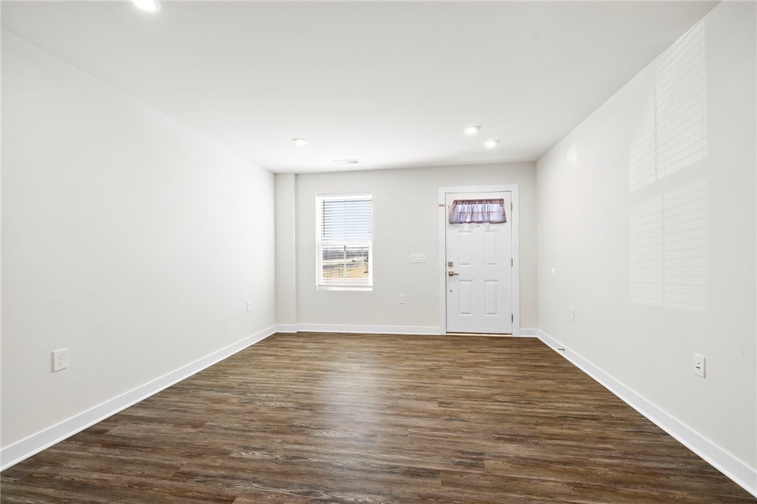506 Roan Creek Trail Anderson, SC 29621 - Photo 5 of 33 Bright and open living space with resilient flooring, ready for your personal touch.