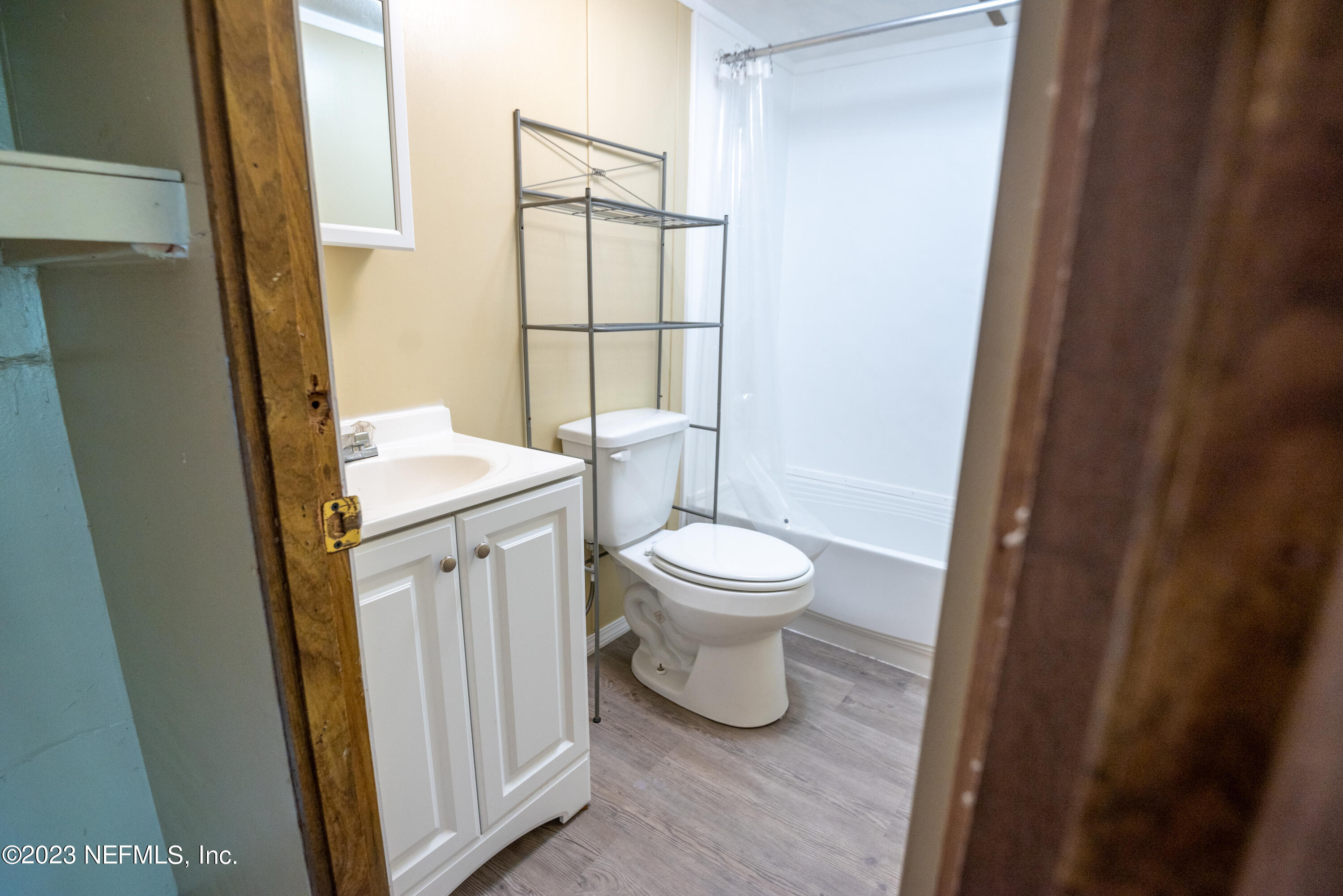 7230 Oakhill Road Keystone Heights, FL 32656 - Photo 31 of 38 a white toilet sitting next to a bathroom sink