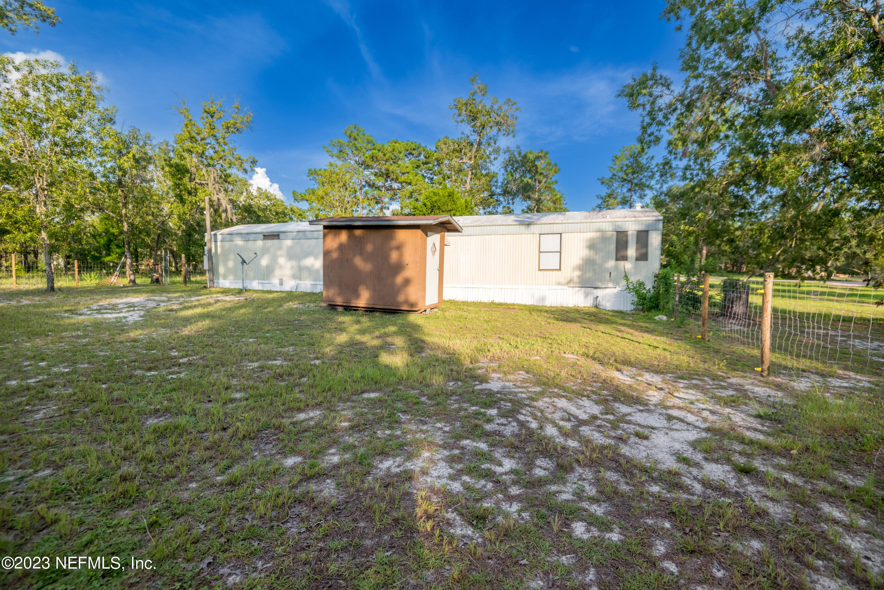 7230 Oakhill Road Keystone Heights, FL 32656 - Photo 37 of 38 a view of a house with a yard