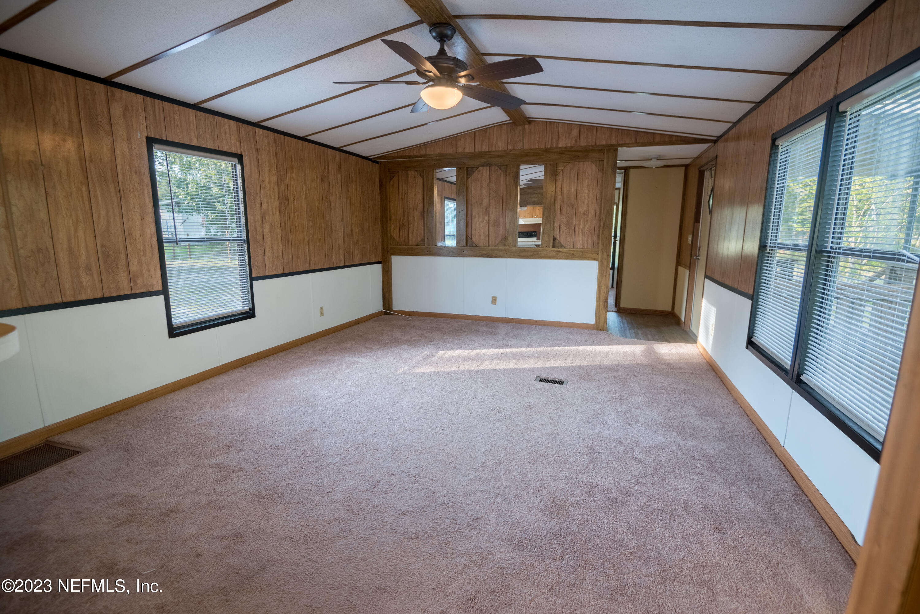 7230 Oakhill Road Keystone Heights, FL 32656 - Photo 5 of 38 a view of an empty room with a window