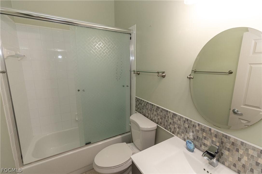 7500 Cameron Circle Fort Myers, FL 33912 - Photo 19 of 21 a bathroom with a toilet and a shower