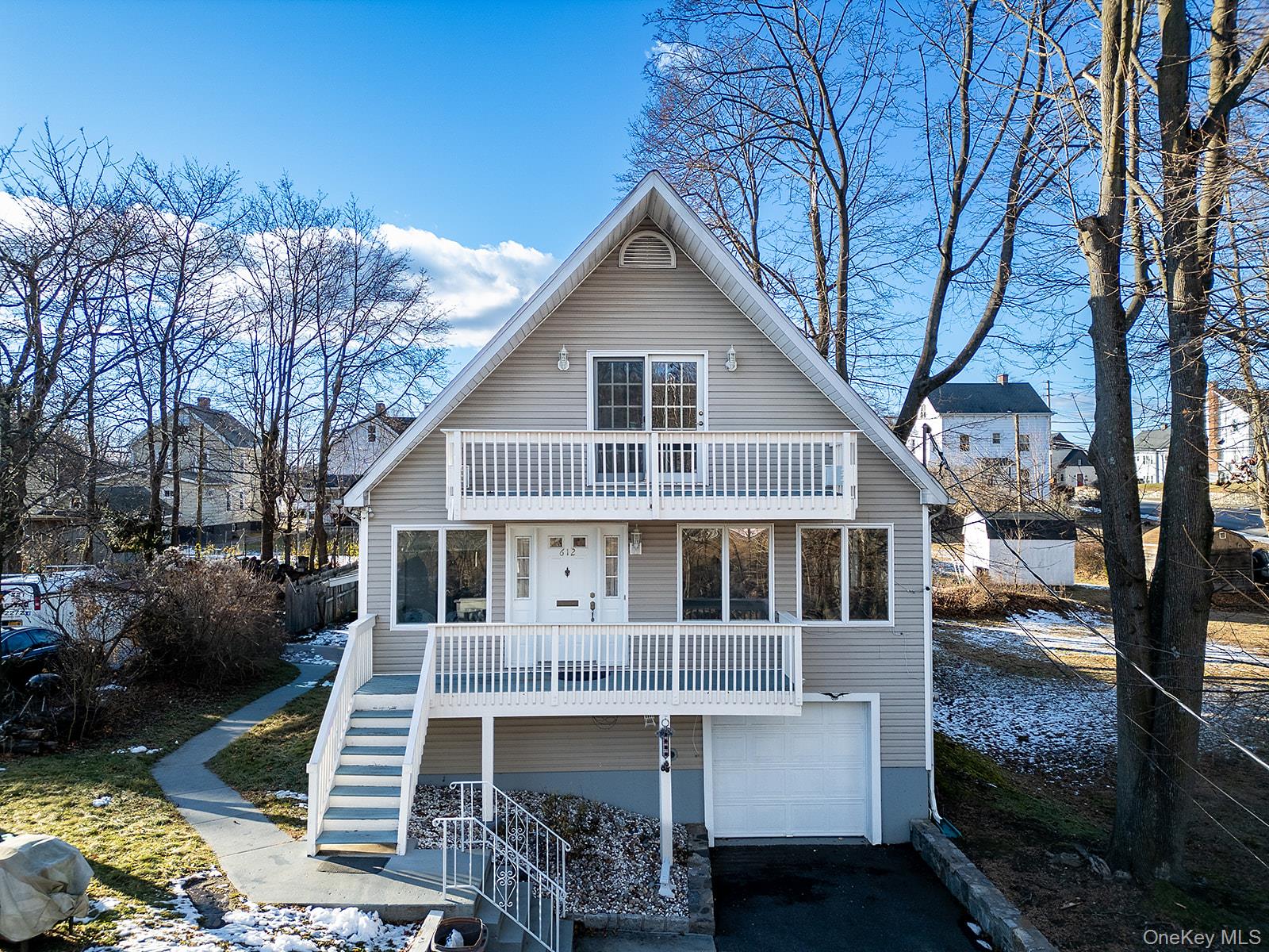 612 Ringgold Street Peekskill, NY 10566 - Photo 13 of 23 a front view of a house with a yard