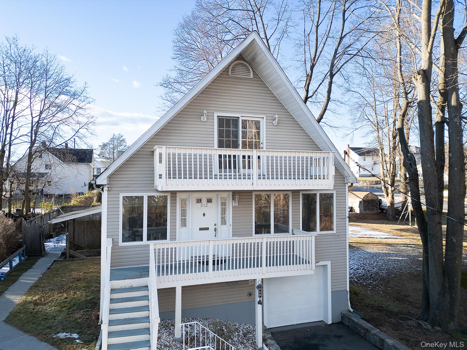 612 Ringgold Street Peekskill, NY 10566 - Photo 16 of 23 a front view of a house with a yard