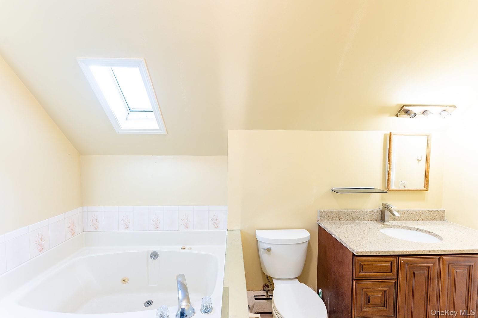 612 Ringgold Street Peekskill, NY 10566 - Photo 19 of 23 a bathroom with a sink toilet and shower