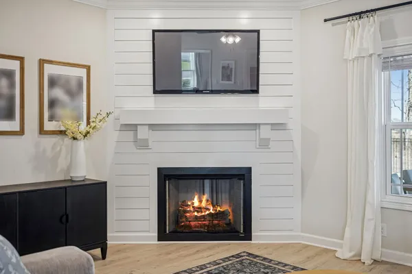 a bathroom with a granite countertop sink mirror and double