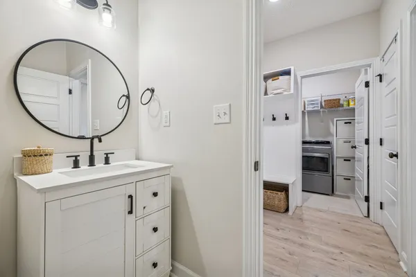 a view of a swimming pool with a table and chairs