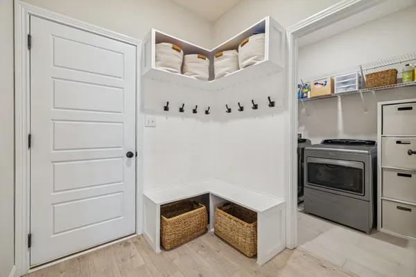 a view of swimming pool with outdoor seating and plants