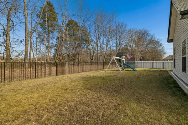 a view of a swimming pool with an outdoor space