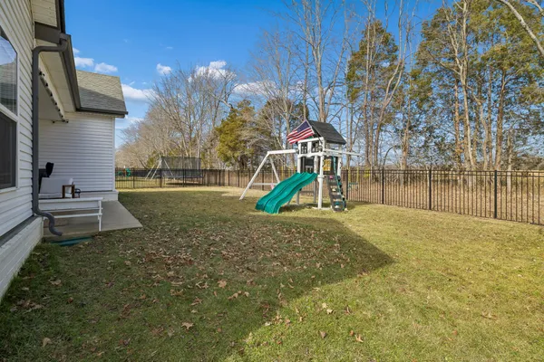 a room with gym equipment and a large window