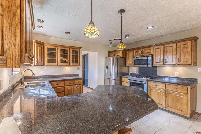 a view of a livingroom with furniture window and wooden floor