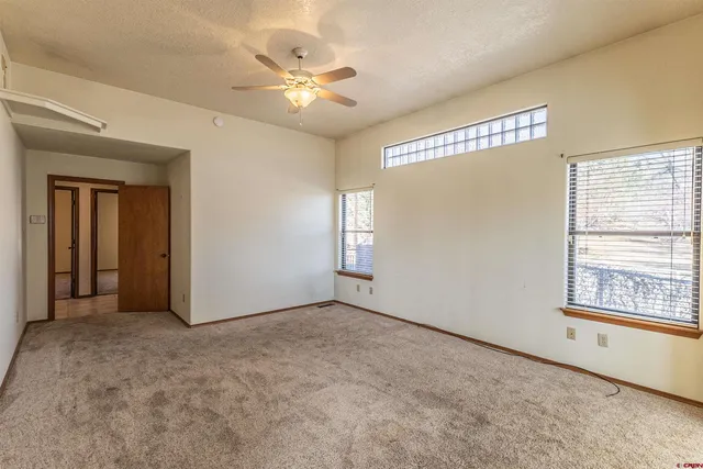 a spacious bathroom with a double vanity sink mirror and