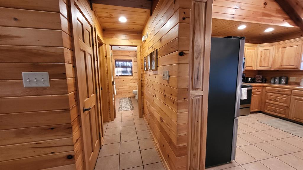 9 Private Road Leesburg, TX 75451 - Photo 15 of 26 a bathroom with a shower