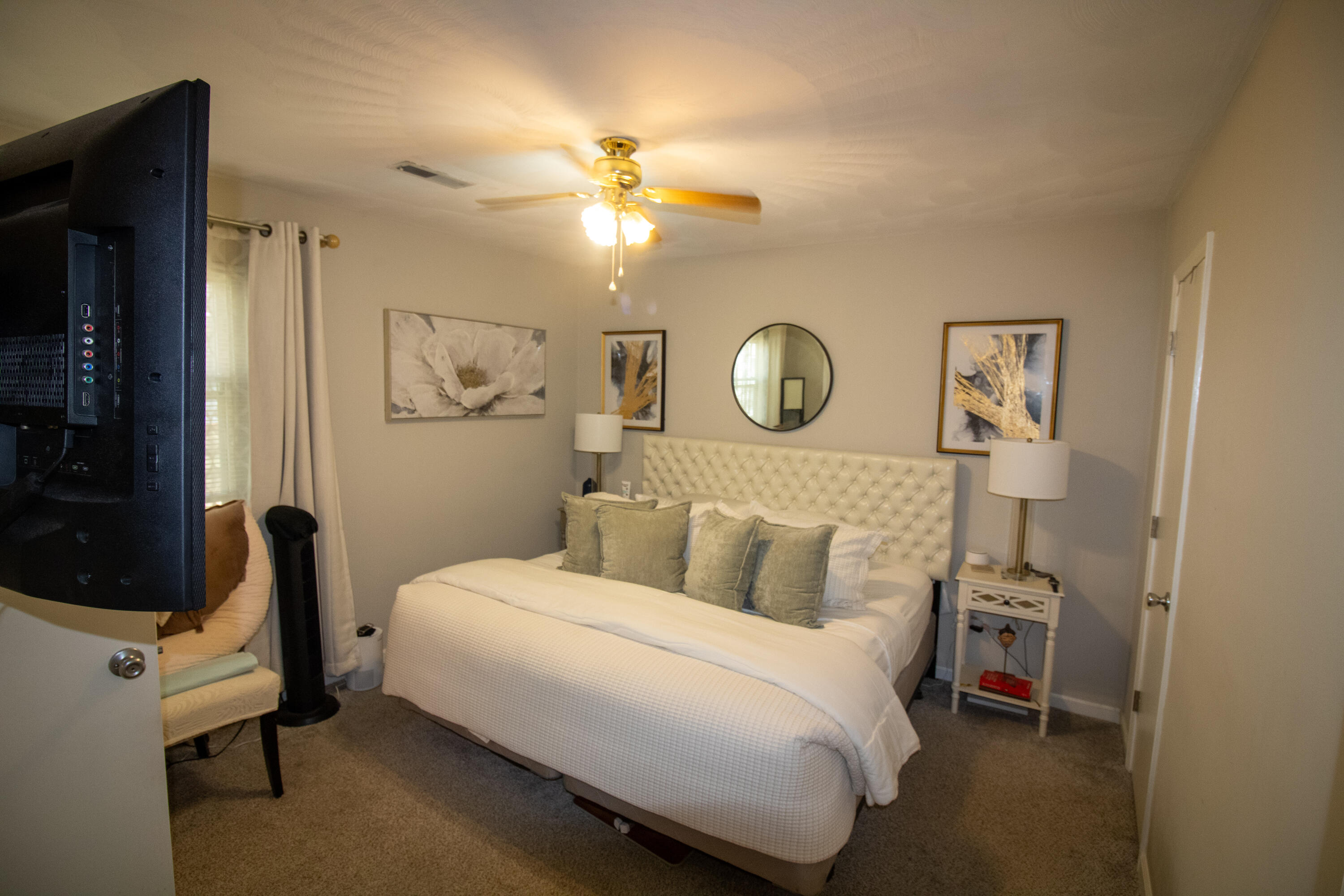 1858 Kiska Road Salem, VA 24153 - Photo 13 of 21 a bedroom with a bed and a chandelier