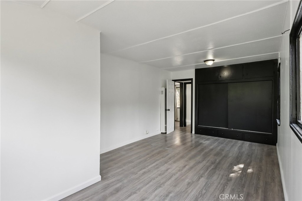 532 Sunset Lane Crestline, CA 92325 - Photo 18 of 41 a view of an empty room with wooden floor