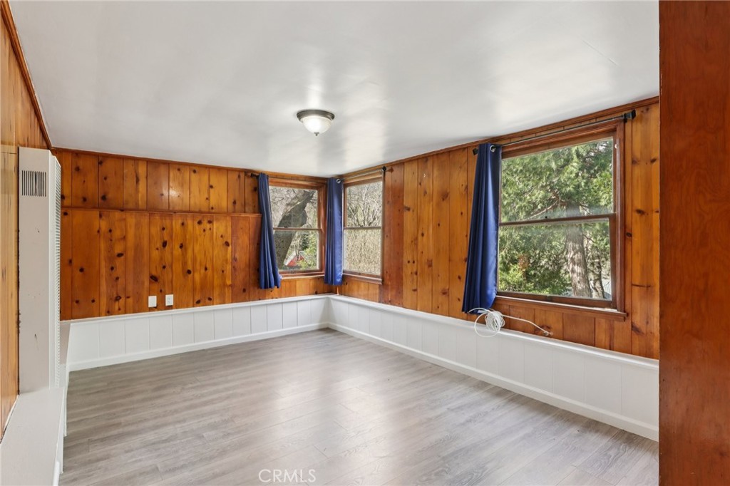 532 Sunset Lane Crestline, CA 92325 - Photo 23 of 41 wooden floor in an empty room with a window