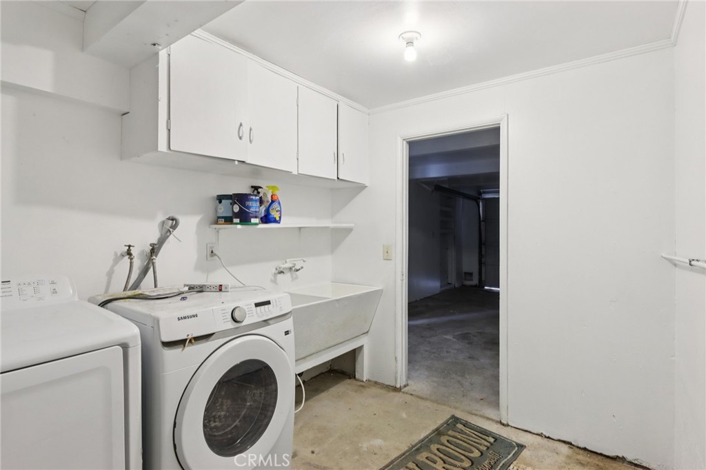 532 Sunset Lane Crestline, CA 92325 - Photo 26 of 41 a view of storage and utility room with washer and dryer