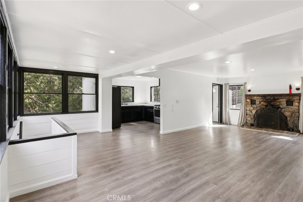 532 Sunset Lane Crestline, CA 92325 - Photo 35 of 41 a view of an empty room with wooden floor and a window