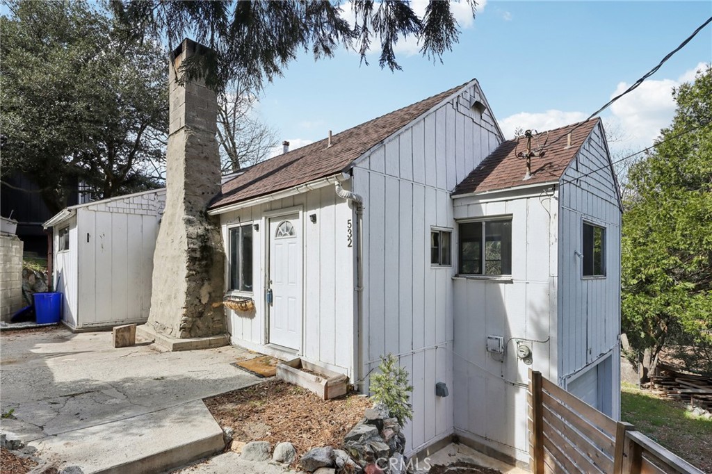 532 Sunset Lane Crestline, CA 92325 - Photo 4 of 41 a view of a house with backyard and trees