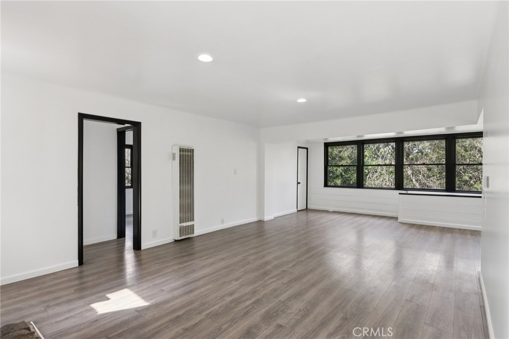 532 Sunset Lane Crestline, CA 92325 - Photo 7 of 41 wooden floor in an empty room with a window