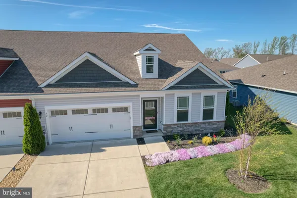 a front view of house with yard