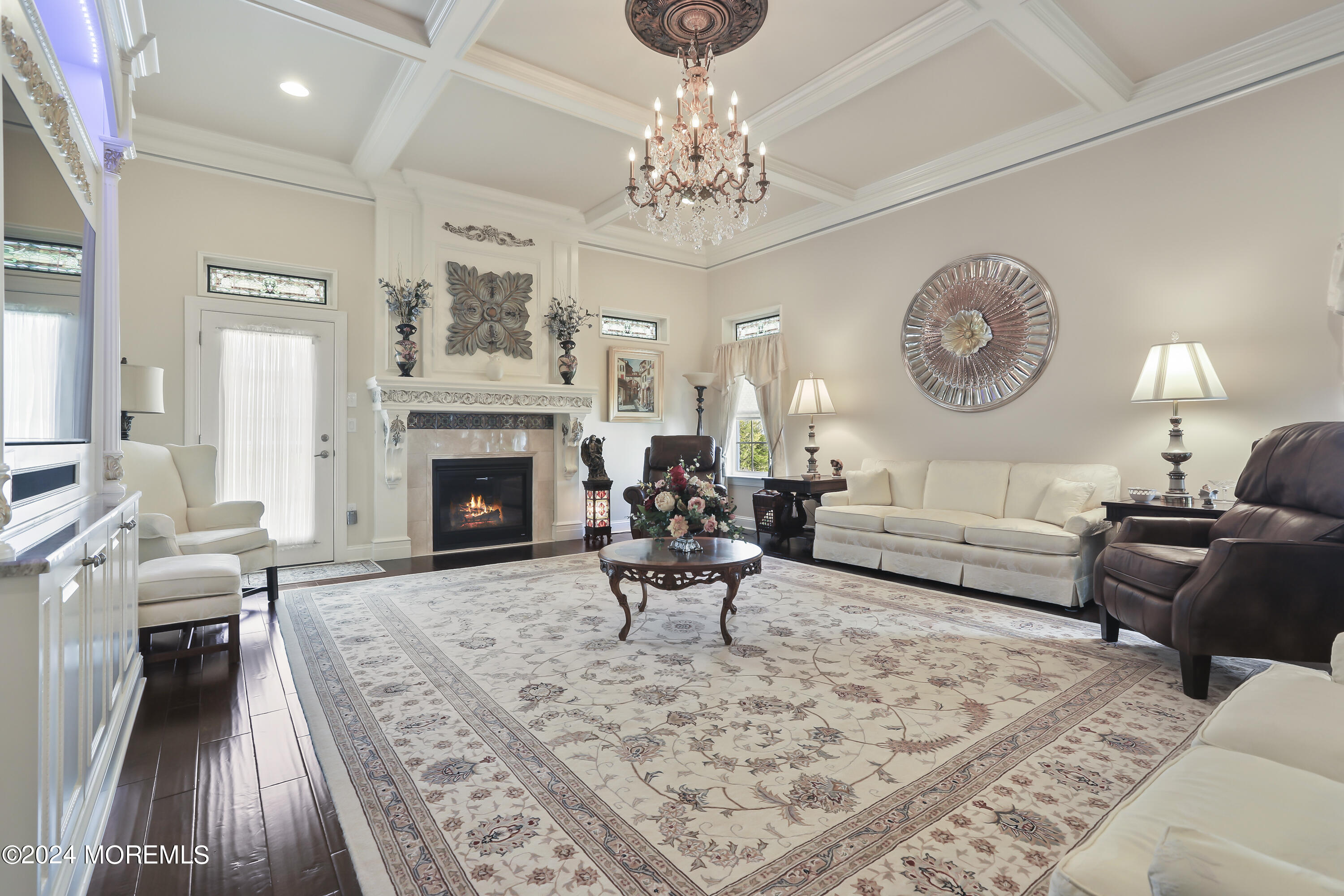 3 Garden Path Barnegat, NJ 08005 - Photo 18 of 59 a living room with furniture a fireplace and a chandelier