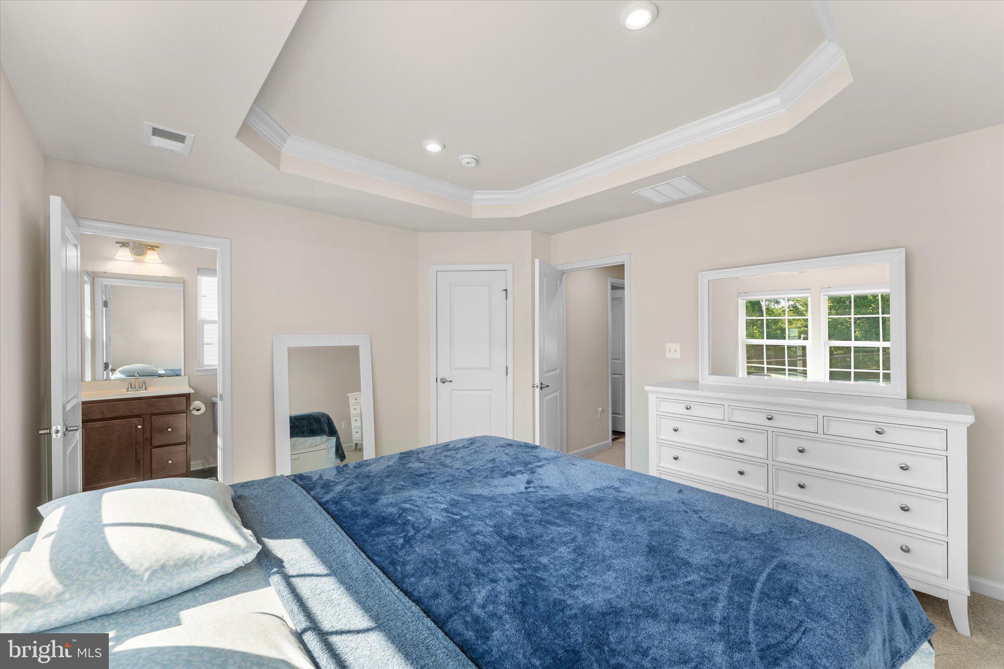 1776 Scenic Loop Culpeper, VA 22701 - Photo 21 of 36 a spacious bedroom with a bed and a dresser