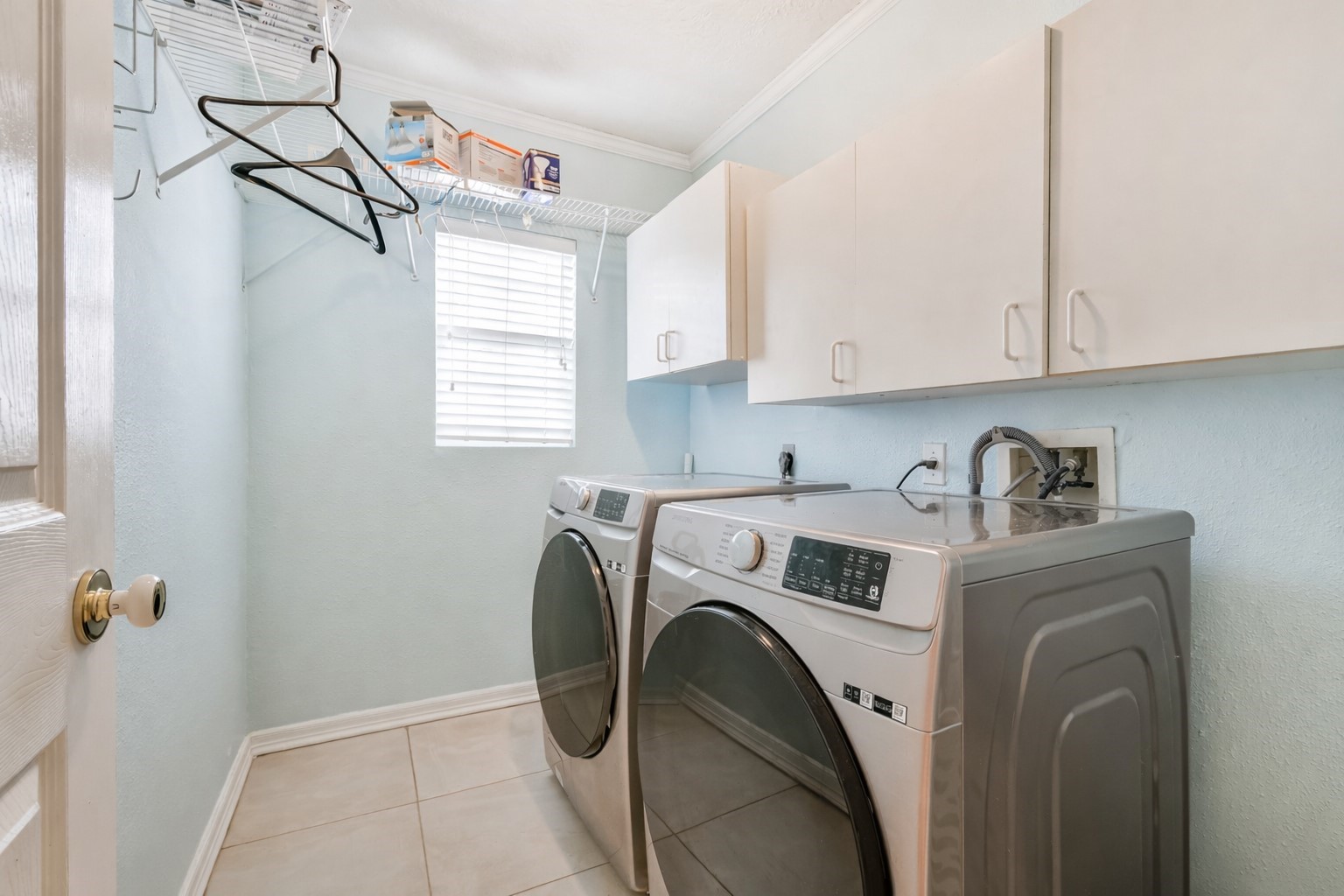 2511 Watts Street Houston, TX 77030 - Photo 31 of 34 The utility room is conveniently located centrally in the home.