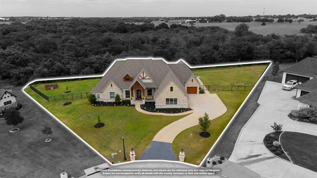 1060 Waters Edge Court Oak Point, TX 75068 - Photo 36 of 40 an aerial view of a house with swimming pool
