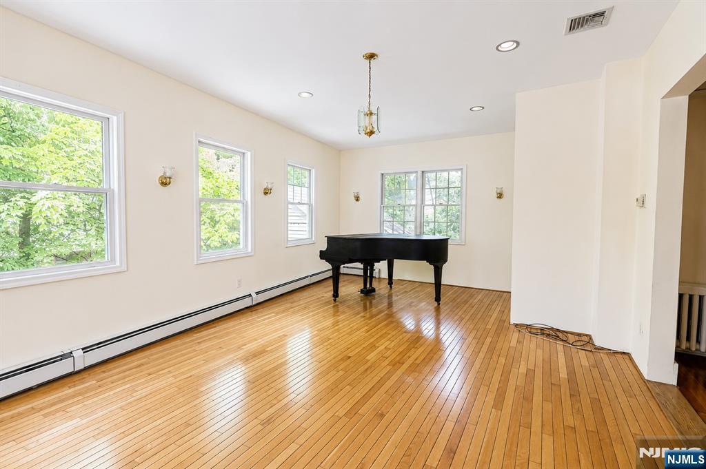 298 Audubon Road Englewood, NJ 07631 - Photo 6 of 19 a view of a livingroom with furniture window and wooden floor