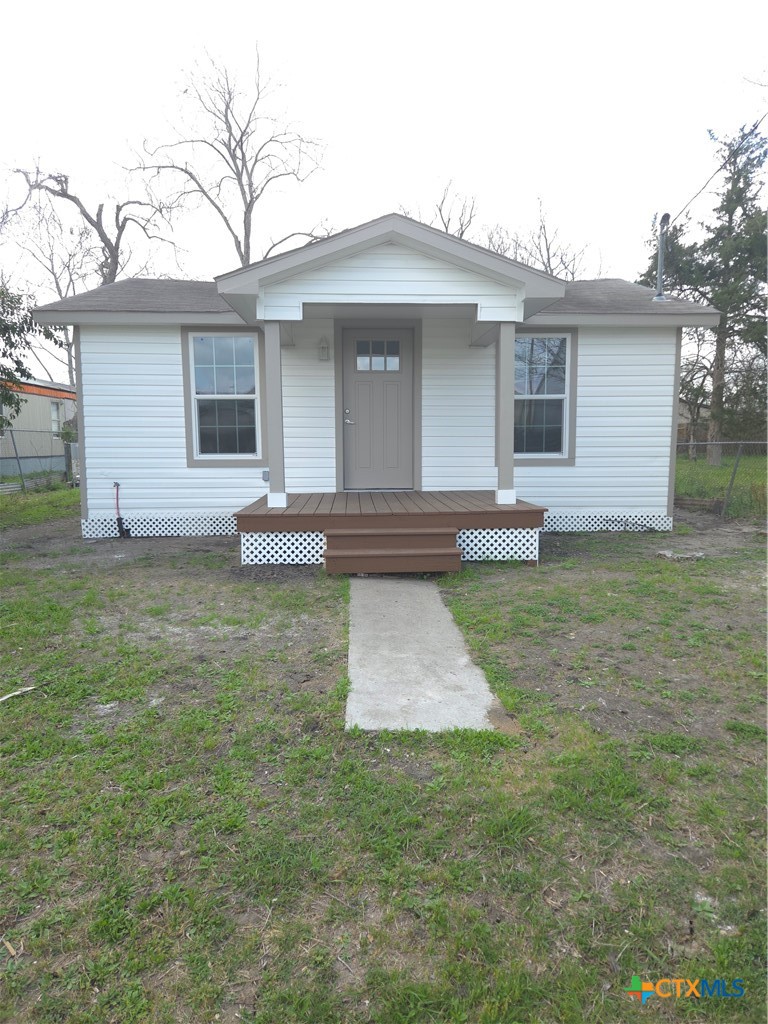 2605 Plainview Street Victoria, TX 77901 - Photo 1 of 16 front view of a house with a yard