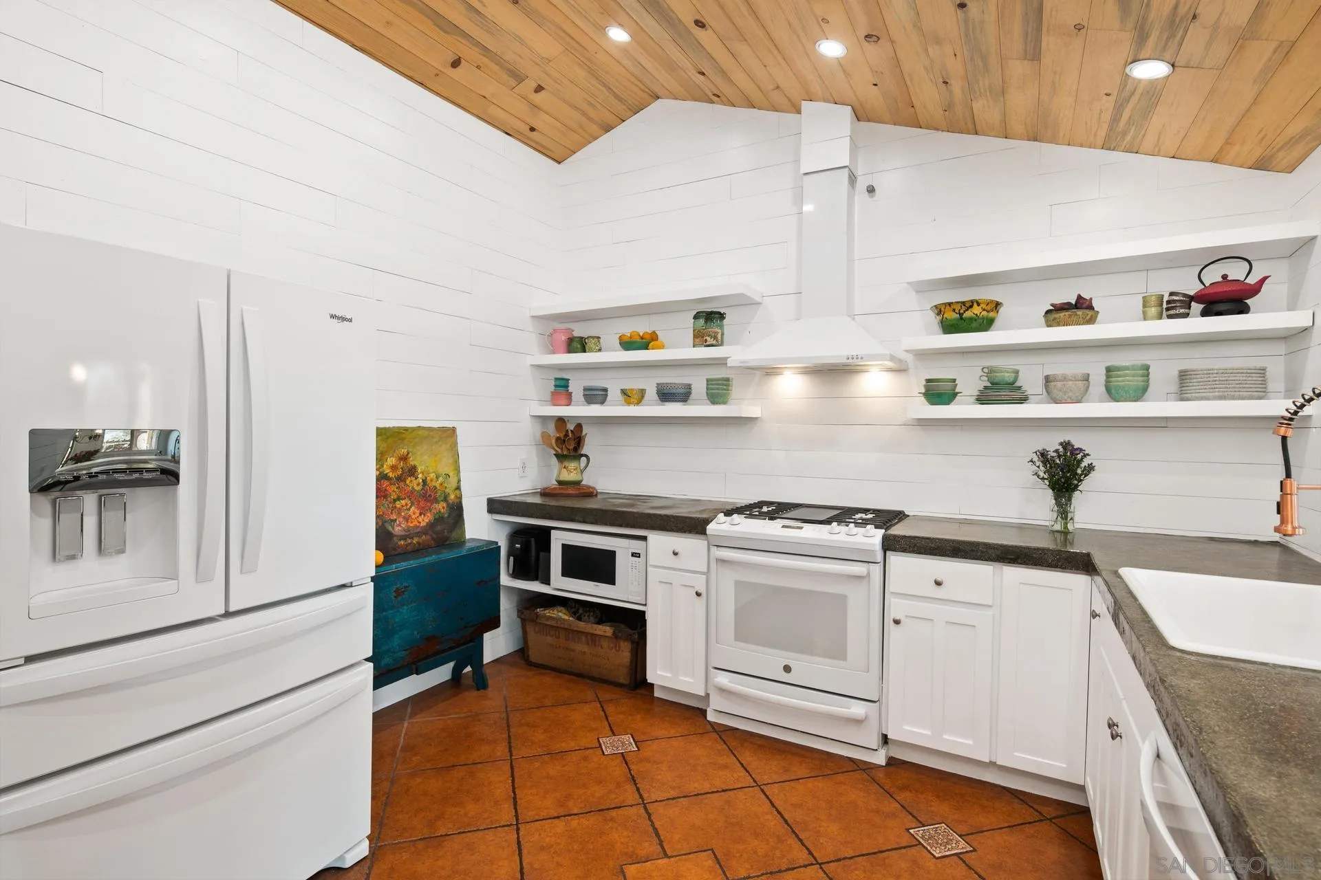 9475 Wharton Road Santee, CA 92071 - Photo 19 of 62 a kitchen with stainless steel appliances granite countertop a sink and a stove
