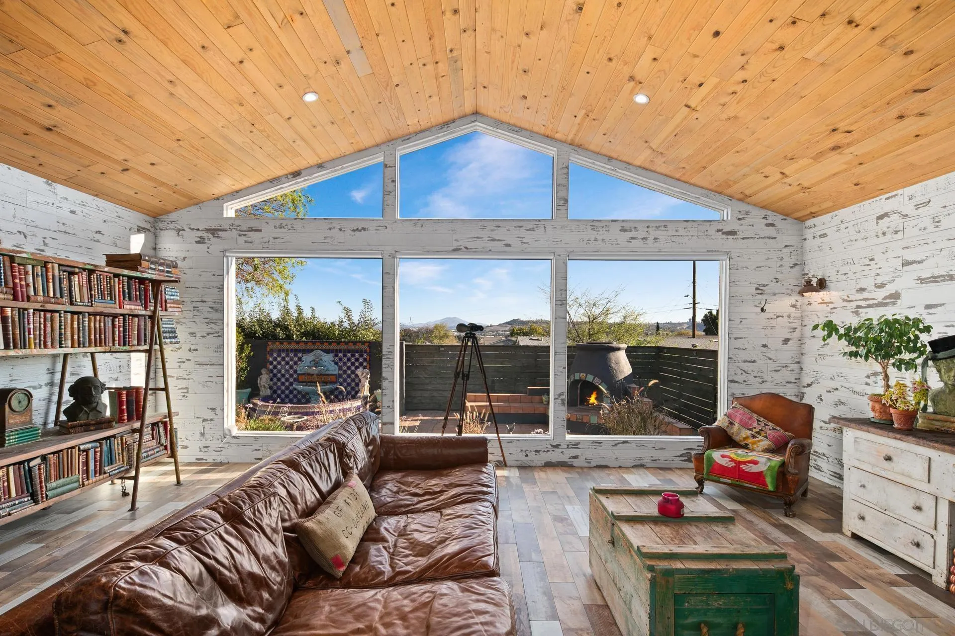 9475 Wharton Road Santee, CA 92071 - Photo 27 of 62 a living room with furniture a flat screen tv and floor to ceiling window