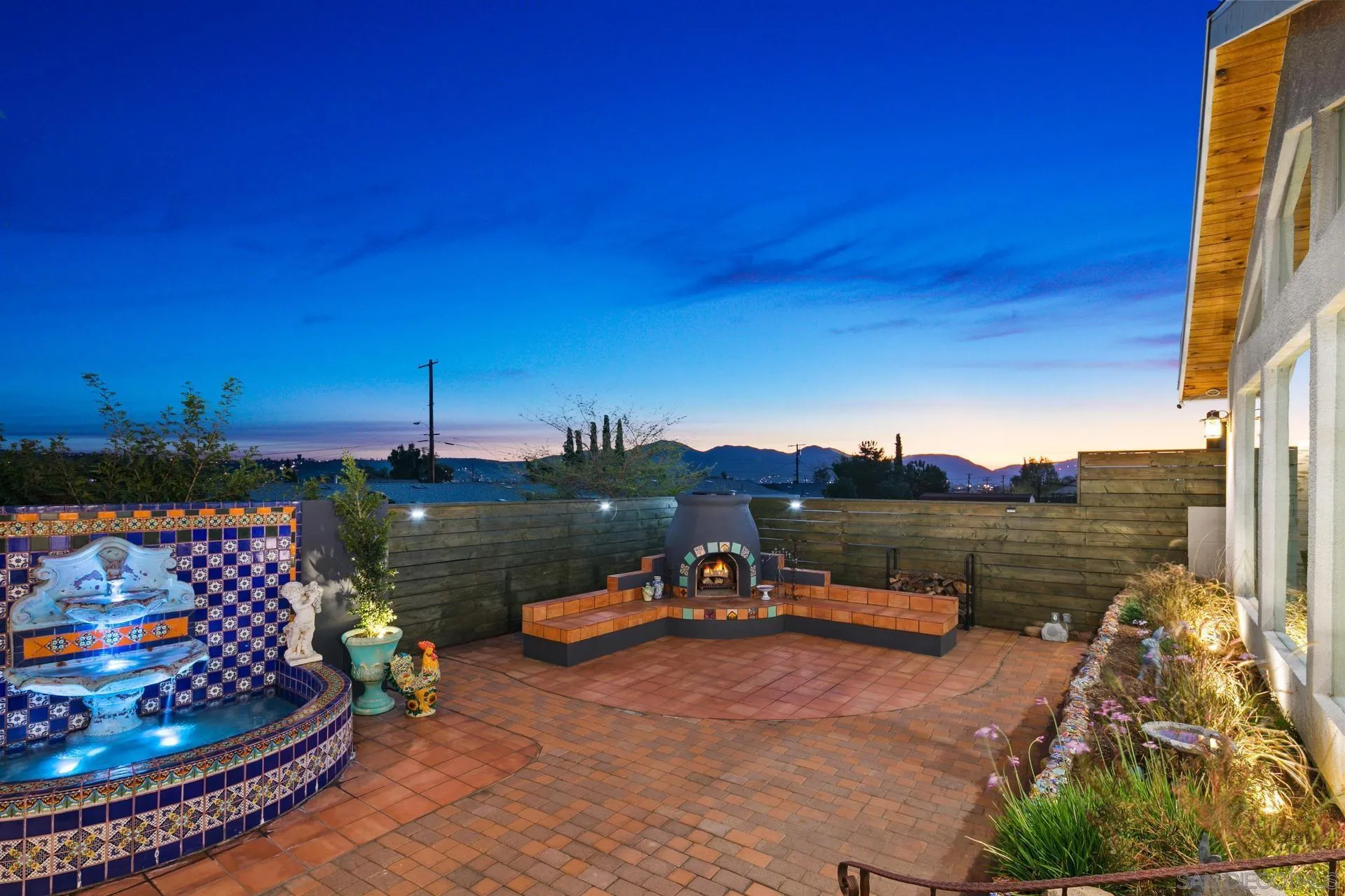 9475 Wharton Road Santee, CA 92071 - Photo 3 of 62 a bench is sitting in the middle of a lake