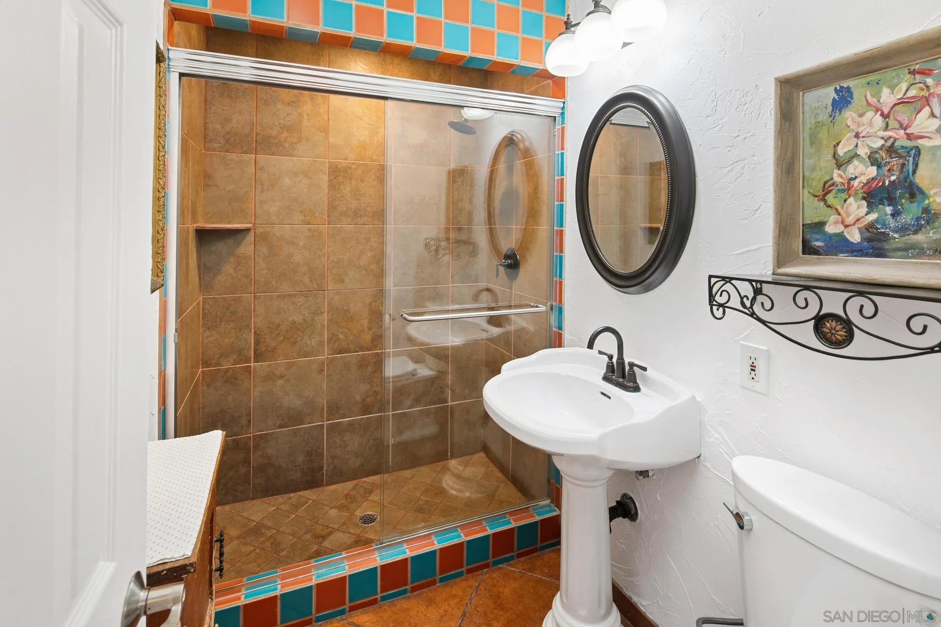 9475 Wharton Road Santee, CA 92071 - Photo 41 of 62 a bathroom with a sink a mirror and a toilet