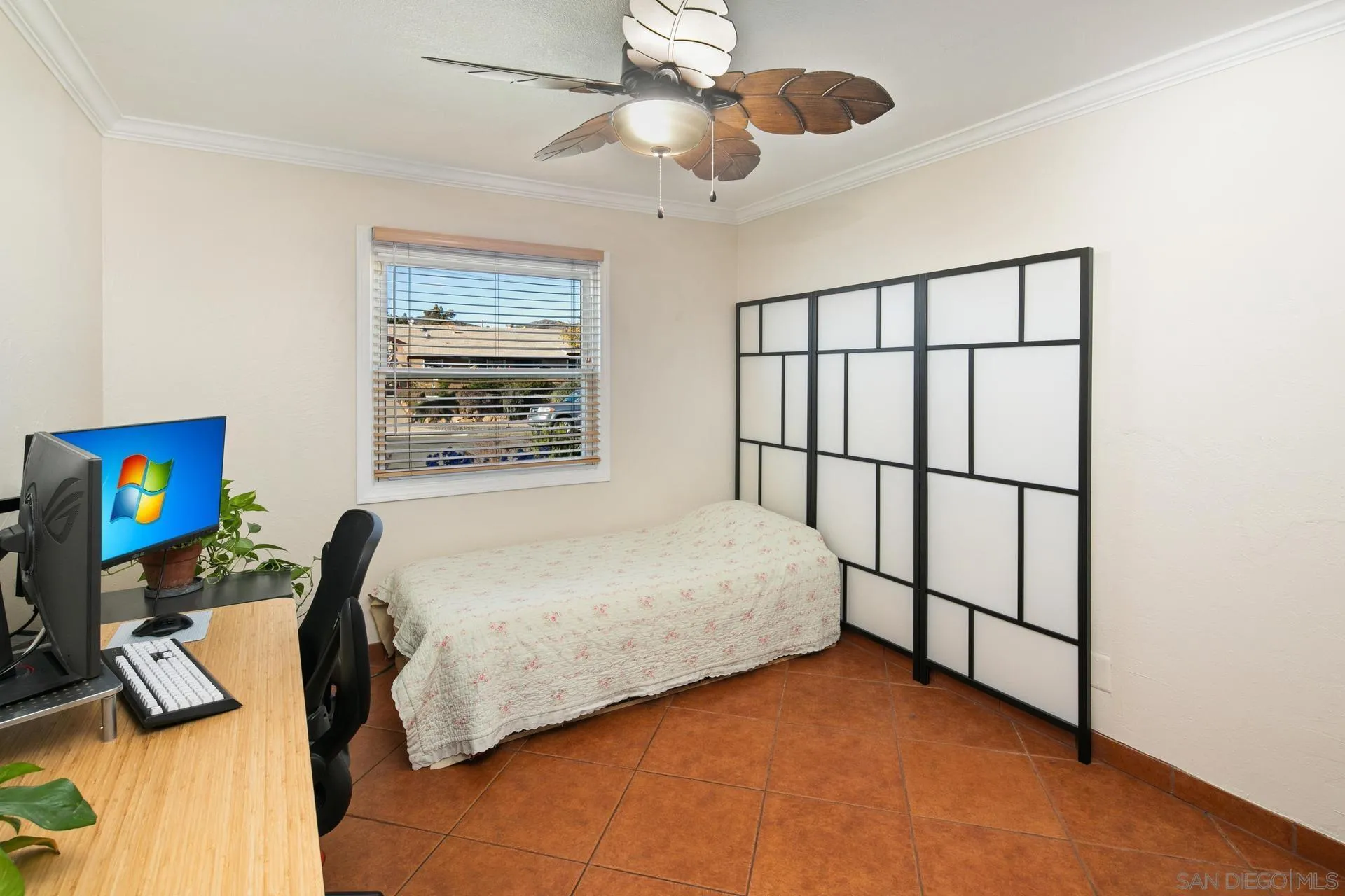 9475 Wharton Road Santee, CA 92071 - Photo 42 of 62 a bedroom with a bed and a flat screen tv