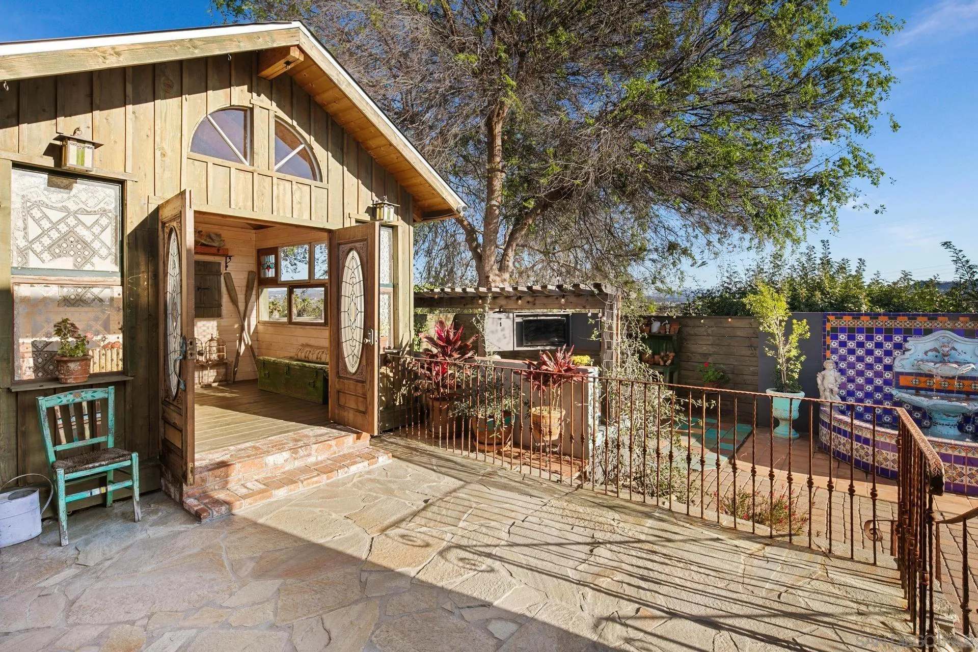 9475 Wharton Road Santee, CA 92071 - Photo 47 of 62 a view of a chair and tables in the balcony