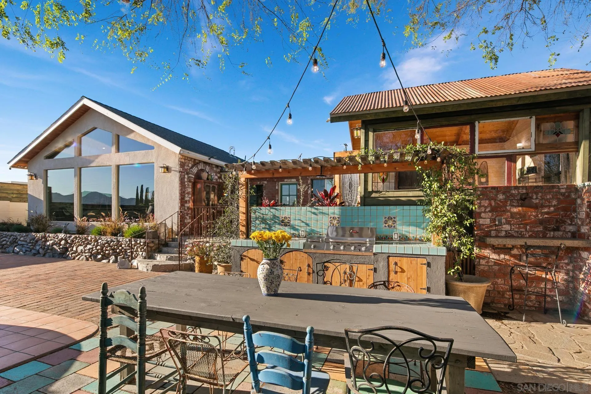 9475 Wharton Road Santee, CA 92071 - Photo 50 of 62 a view of a chairs and table in patio
