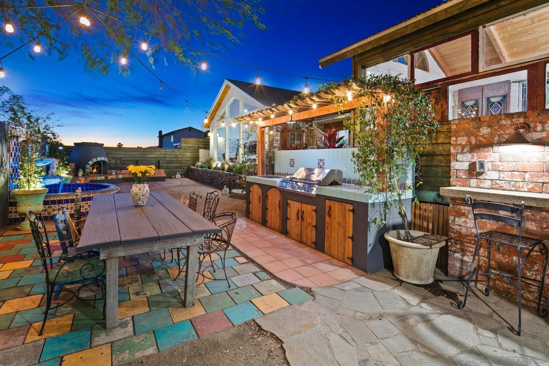 9475 Wharton Road Santee, CA 92071 - Photo 51 of 62 a view of a patio with table and chairs and potted plants