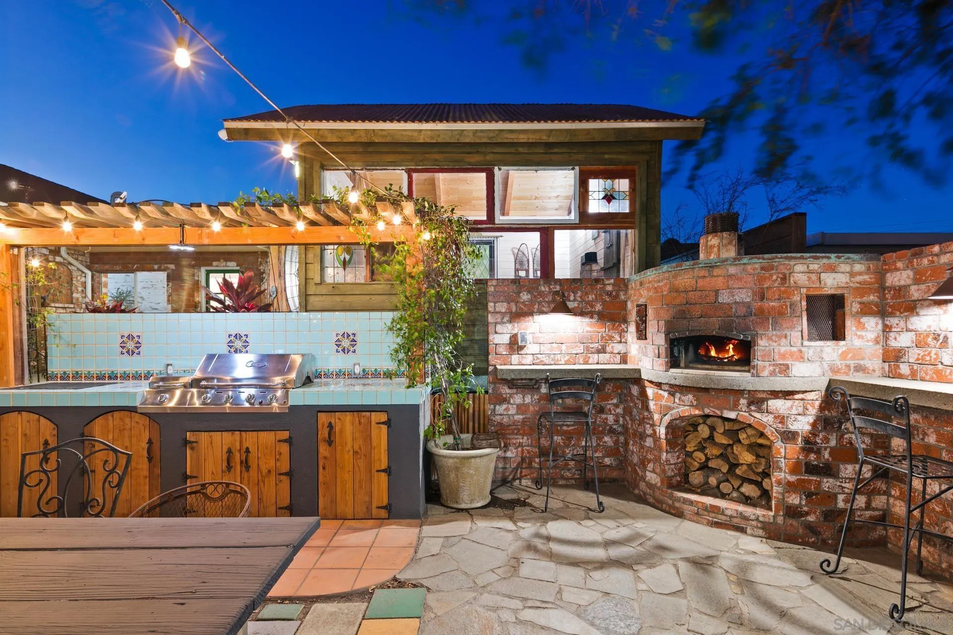 9475 Wharton Road Santee, CA 92071 - Photo 59 of 62 a room with lots of wooden furniture and a fireplace