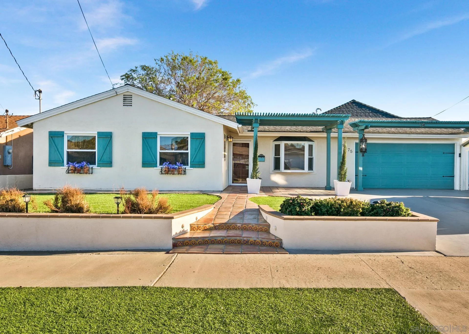 9475 Wharton Road Santee, CA 92071 - Photo 61 of 62 a front view of a house with a yard